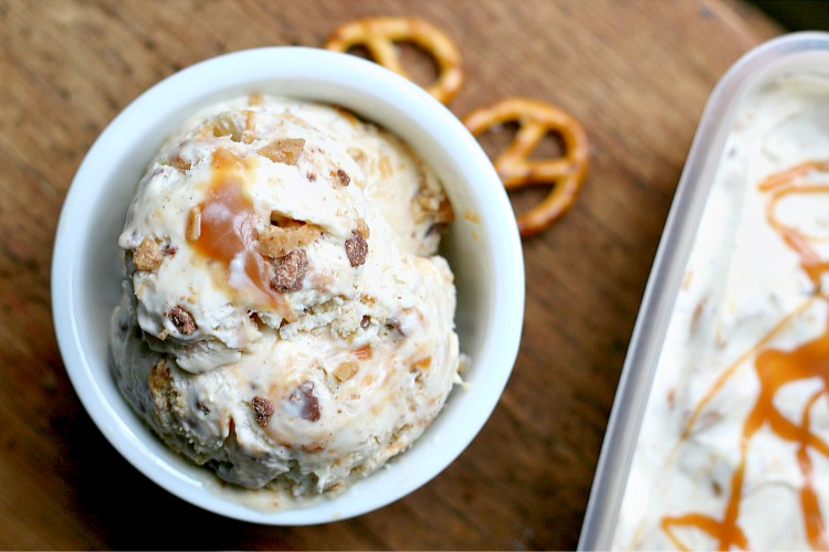No Churn Salted Caramel Toffee Ice Cream - This quick and easy no churn vanilla bean ice cream bursting with salted caramel, toffee bits, and pretzels! The perfect ice cream treat for summer!