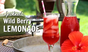 This Spiked Wild Berry Lemonade will hit the spot on hot summer days. Lemonade with tea infused with hibiscus and wild berries and a touch of rum make this summer favorite fun and refreshing.