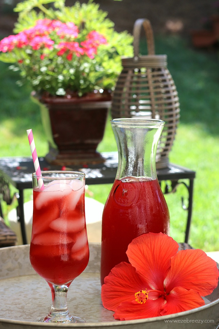 This Spiked Wild Berry Lemonade will hit the spot on hot summer days. Lemonade with tea infused with hibiscus and wild berries and a touch of rum make this summer favorite fun and refreshing.