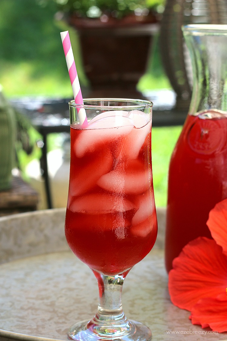 This Spiked Wild Berry Lemonade will hit the spot on hot summer days. Lemonade with tea infused with hibiscus and wild berries and a touch of rum make this summer favorite fun and refreshing.