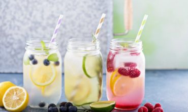 Fruit infused water recipes bursting with flavor and the perfect way to stay hydrated. Fruit water is so easy make and the perfect way to make sure you are drinking enough water every day. Kids love these fruit water recipes too! | ezebreezy.com